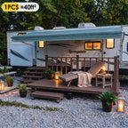 Small 40 sq. ft. modular deck with railing and step installed beside an RV.